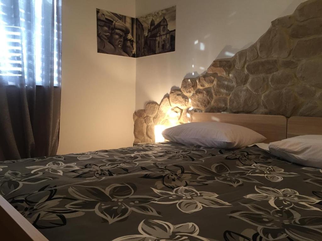 Posteľ alebo postele v izbe v ubytovaní Apartments Ana+3