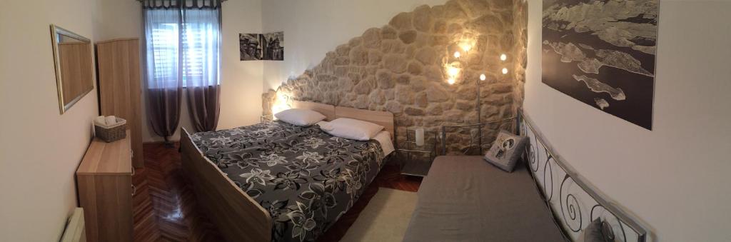 Posteľ alebo postele v izbe v ubytovaní Apartments Ana+3