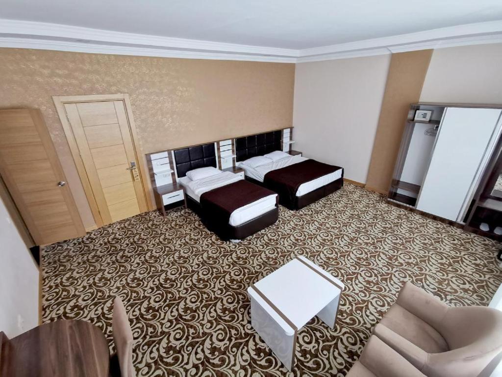 Postel nebo postele na pokoji v ubytování Grand Georgian Palace