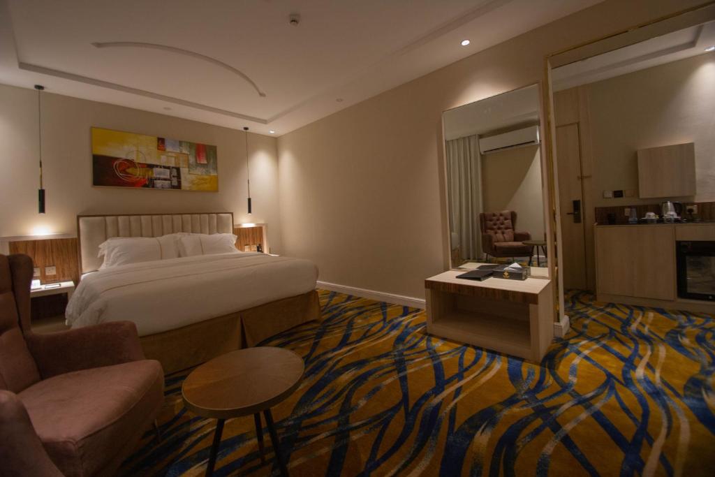 Postel nebo postele na pokoji v ubytování فندق قوبا السويس - Quba Swess Hotel Jazan