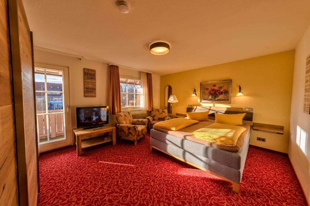 Postel nebo postele na pokoji v ubytování Hotel Sonneneck Titisee -Adults Only-