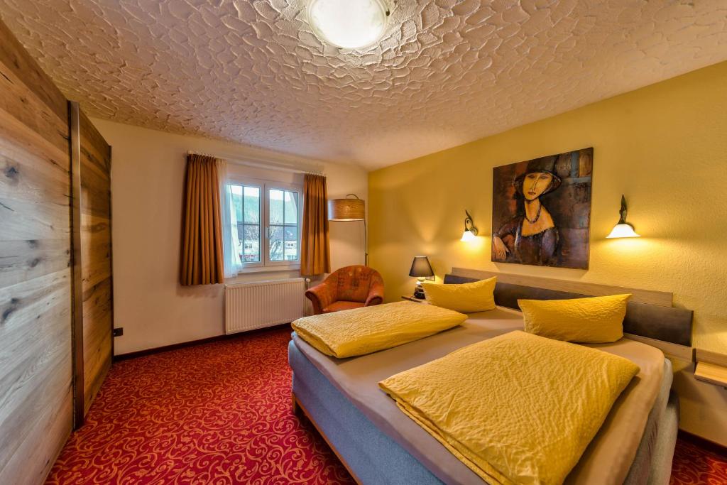 Postel nebo postele na pokoji v ubytování Hotel Sonneneck Titisee -Adults Only-