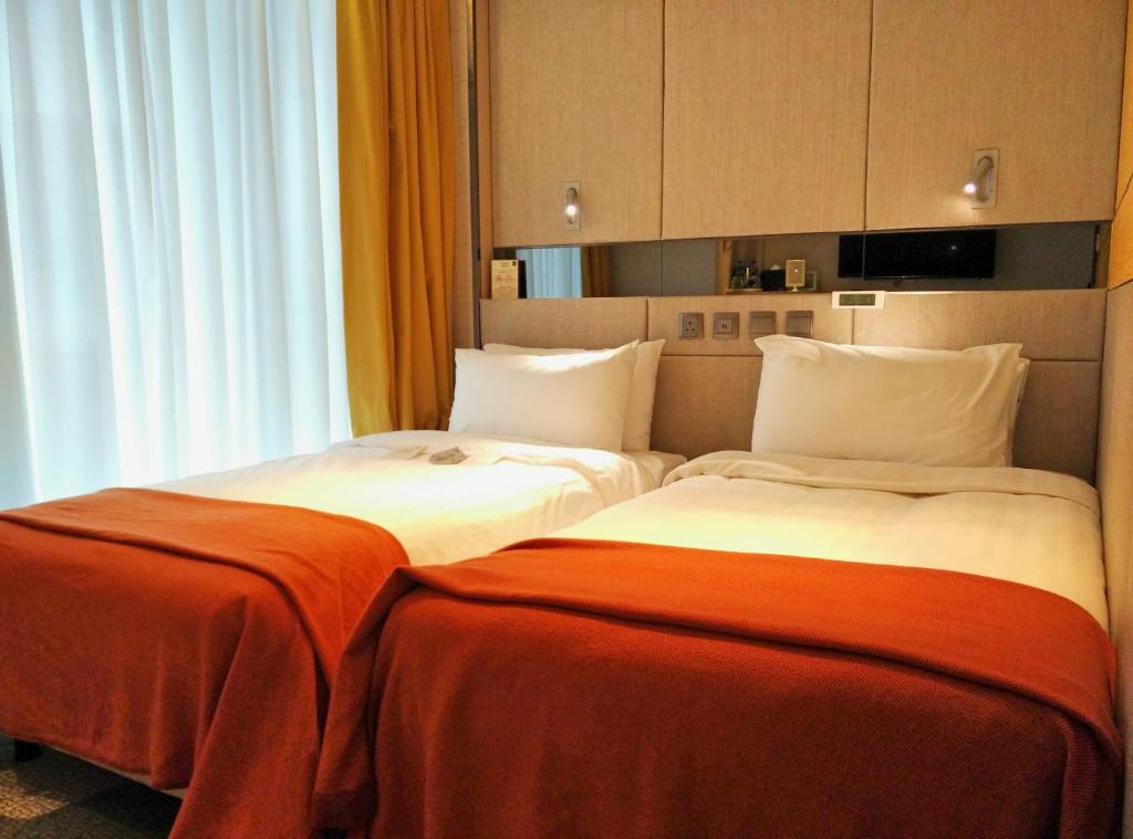 Letto o letti in una camera di Sohotel