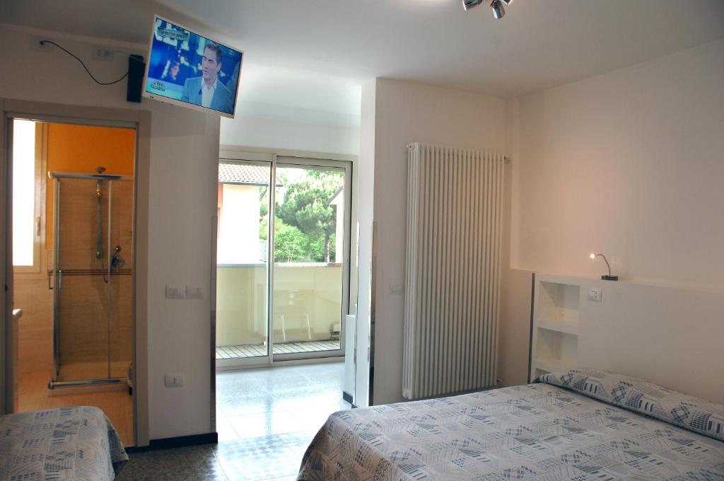 Postel nebo postele na pokoji v ubytování Hotel Marbella