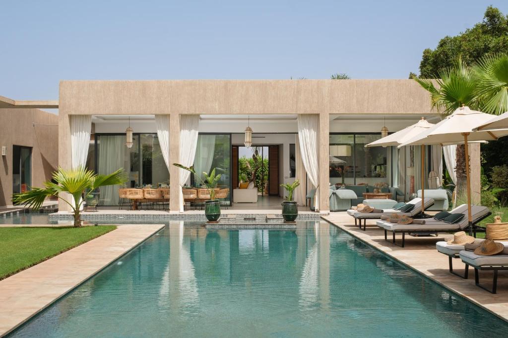 an image of a swimming pool in a villa at Villa Netumia in Marrakesh