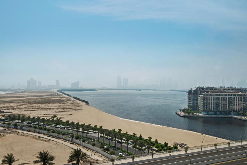 تصویر اتاق‌های Pool side view at Dubai Creek Harbour by DuStay - تصویر ۲