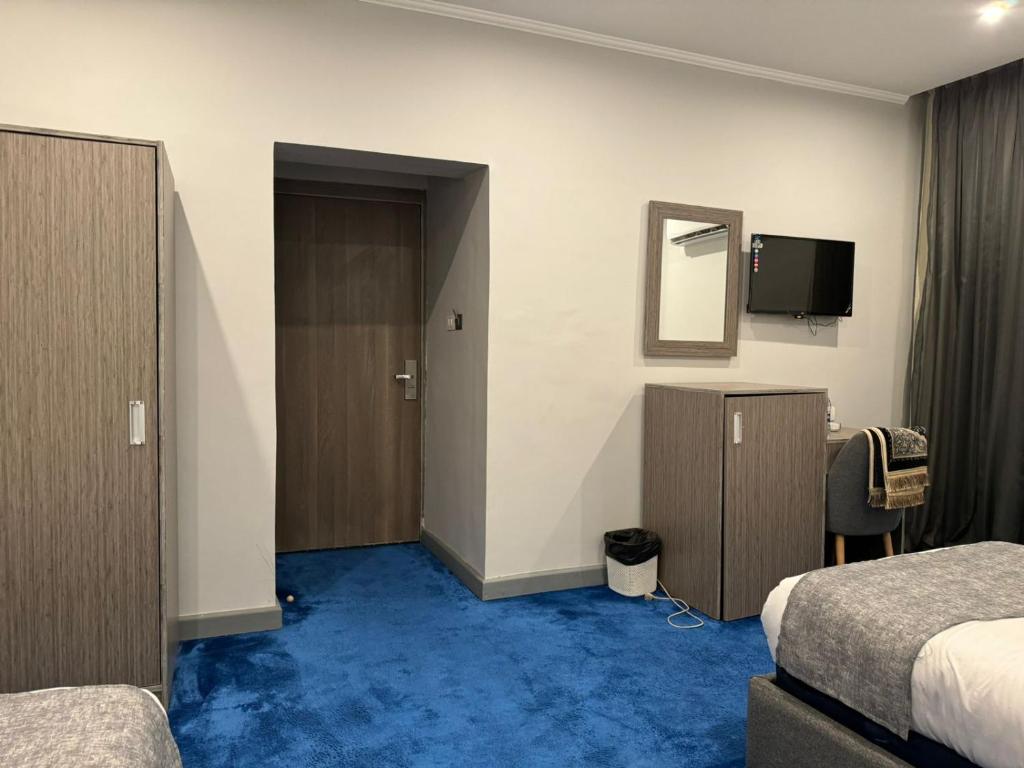 Postel nebo postele na pokoji v ubytování nuba nile hotel