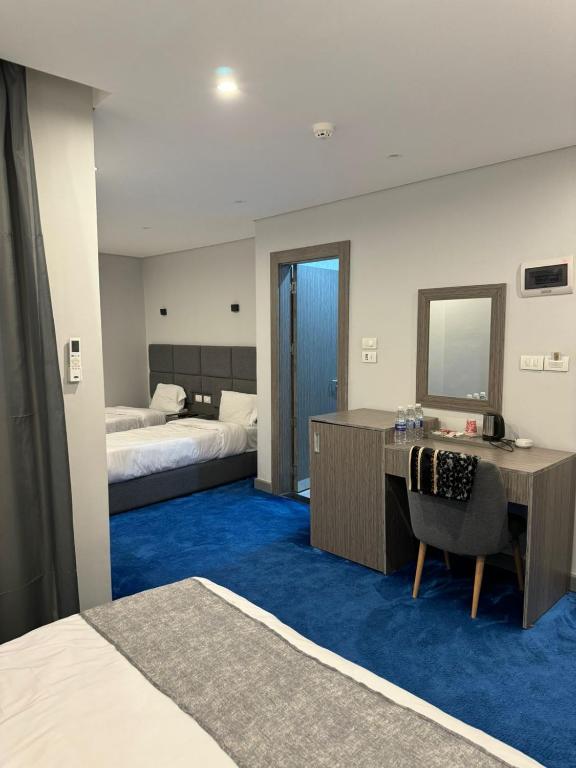 Postel nebo postele na pokoji v ubytování nuba nile hotel