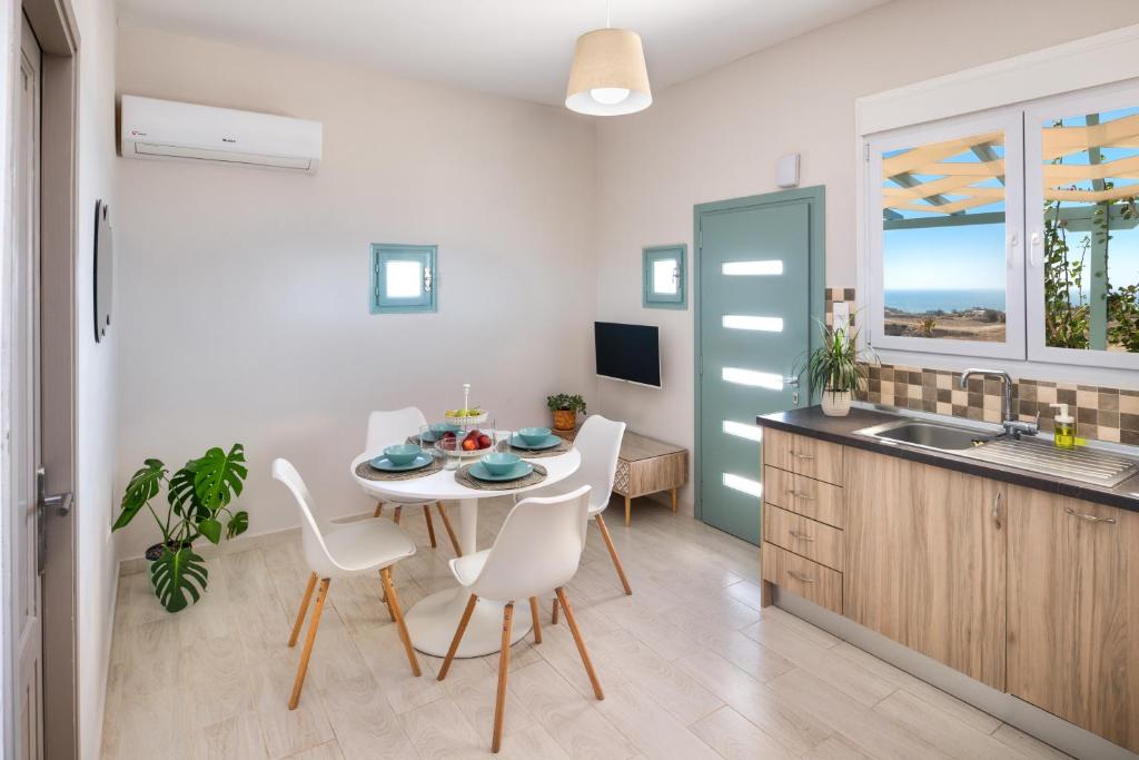 TV a/nebo společenská místnost v ubytování Dune Santorini Summer House