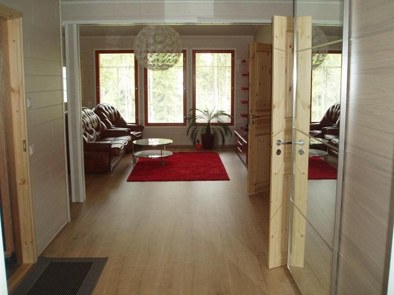 Posezení v ubytování Scandinavian Dream Cottages Vikajarvi- Rovaniemi