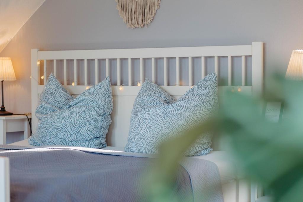 Postel nebo postele na pokoji v ubytování Ferienwohnung Skandi