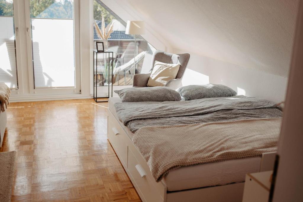 Postel nebo postele na pokoji v ubytování Ferienwohnung Skandi
