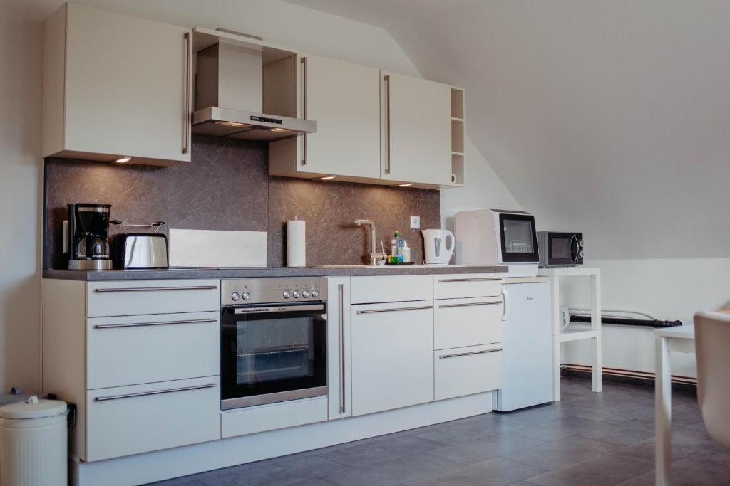 Kuchyň nebo kuchyňský kout v ubytování Ferienwohnung Skandi