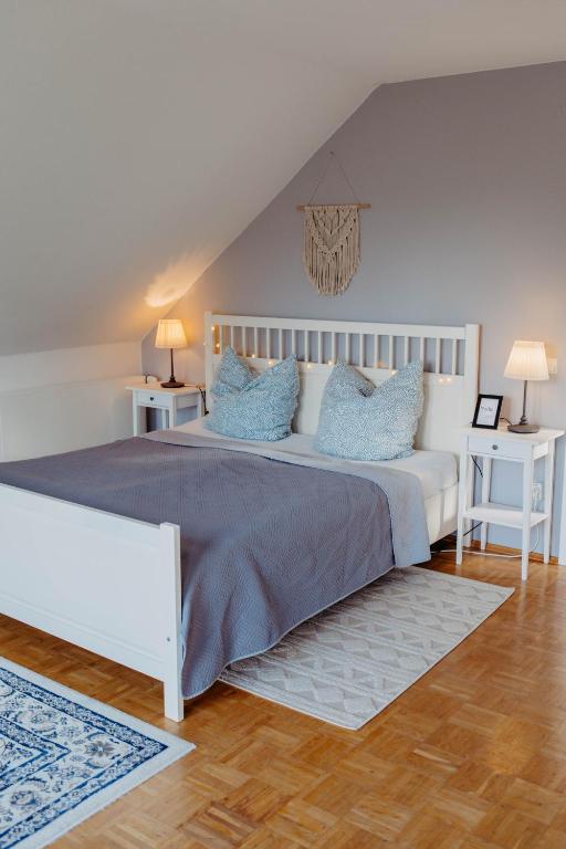 Postel nebo postele na pokoji v ubytování Ferienwohnung Skandi