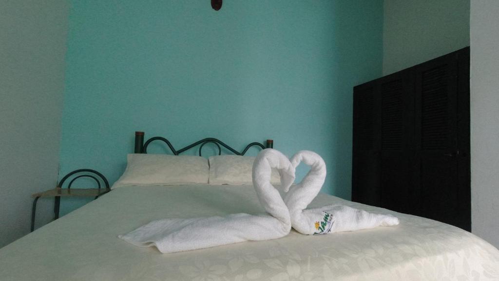 Postel nebo postele na pokoji v ubytování Miami Hotel