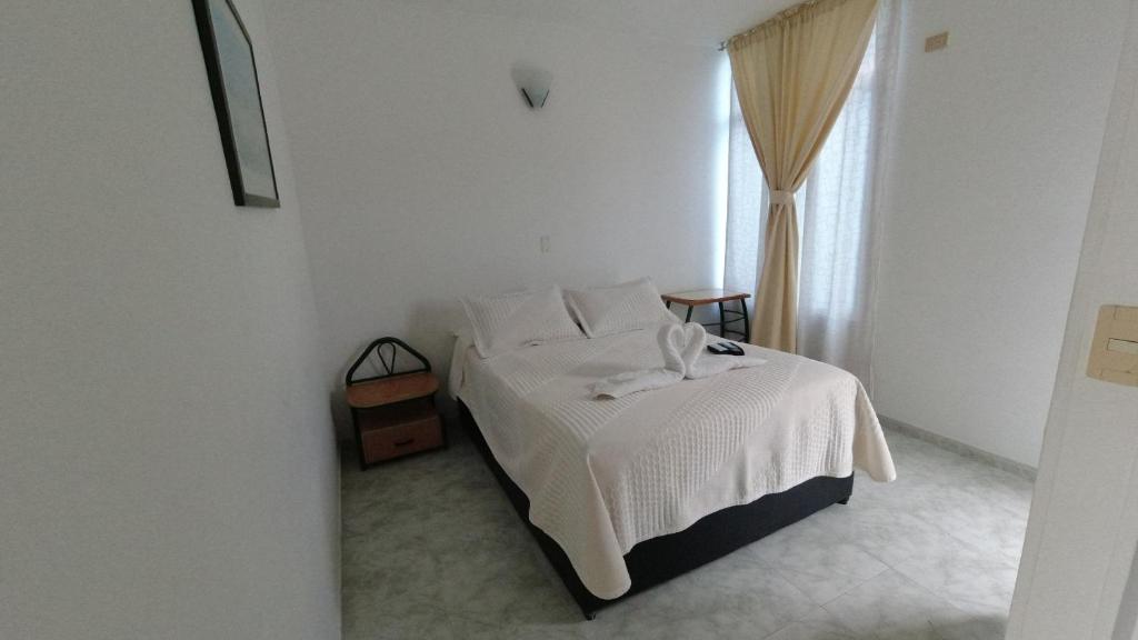 Postel nebo postele na pokoji v ubytování Miami Hotel