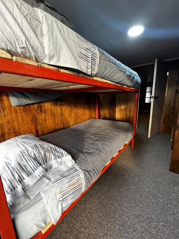 Postel nebo postele na pokoji v ubytování Hostel Rosa de los Vientos