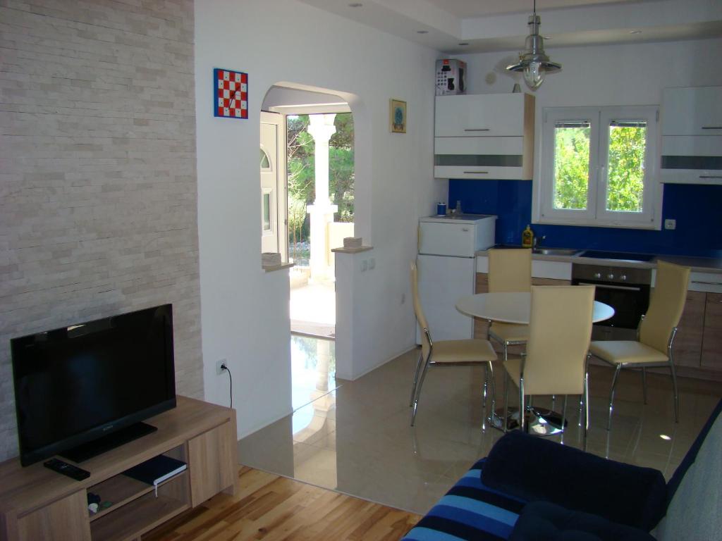 Kuchyň nebo kuchyňský kout v ubytování Apartments Pinus