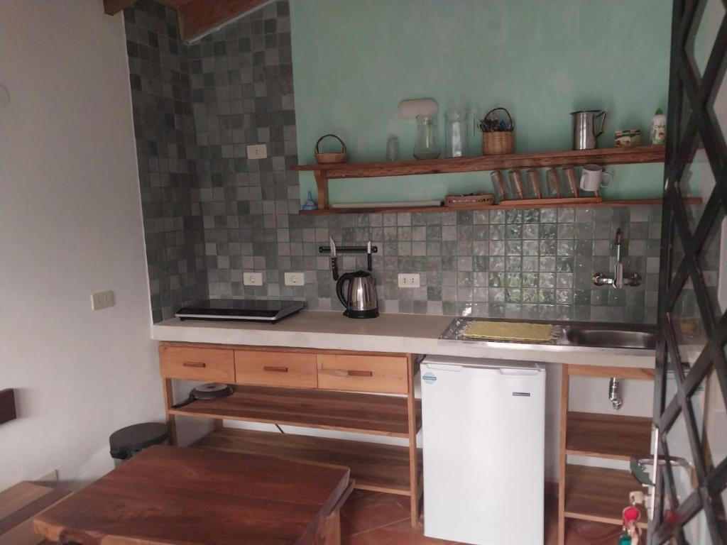 Kuchyň nebo kuchyňský kout v ubytování Casita de Piedra