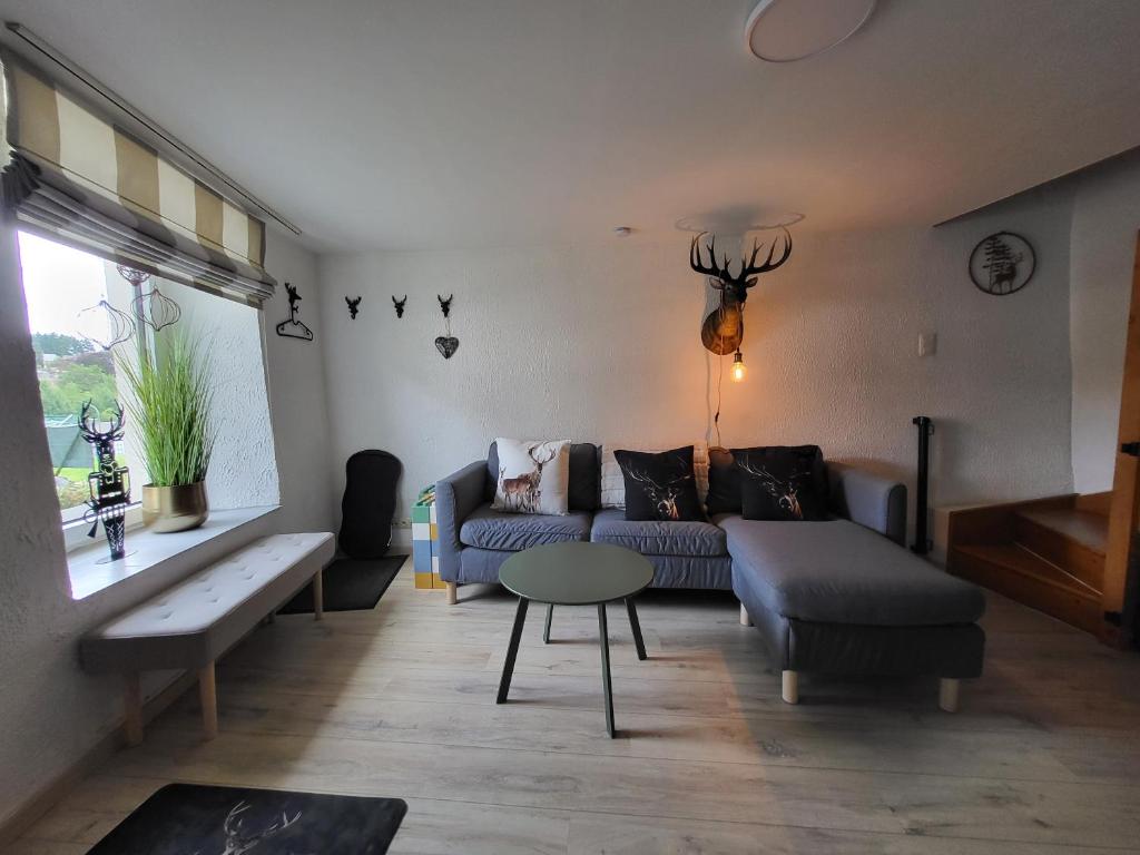 Posezení v ubytování Le Grand Cerf gîte citadin