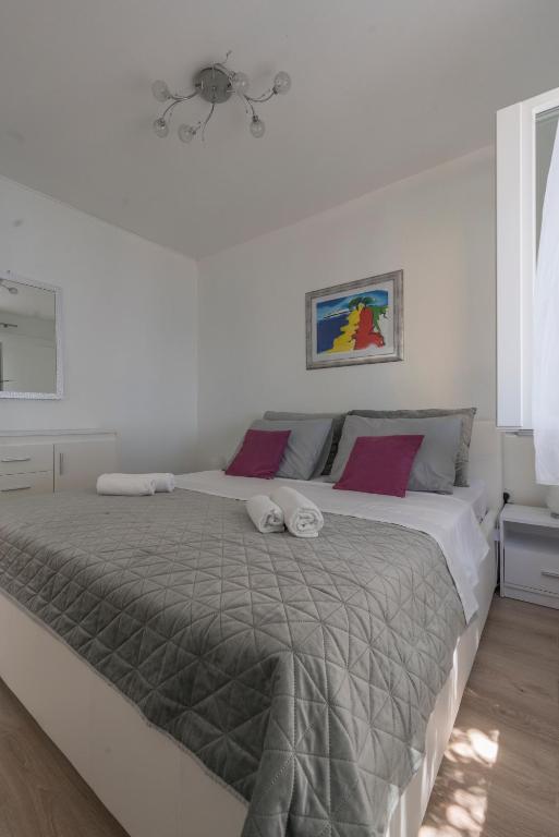 Krevet ili kreveti u jedinici u objektu Seafront Villa Toma with Heated Pool