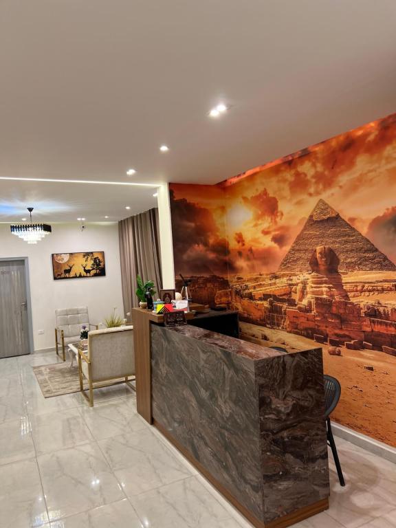 TV a/nebo společenská místnost v ubytování Pyramids moon view inn