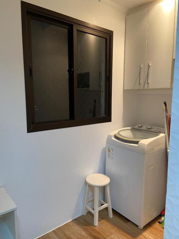 A cozinha ou cozinha compacta de Apartamento na Enseada com vista para o mar - 300 m da praia