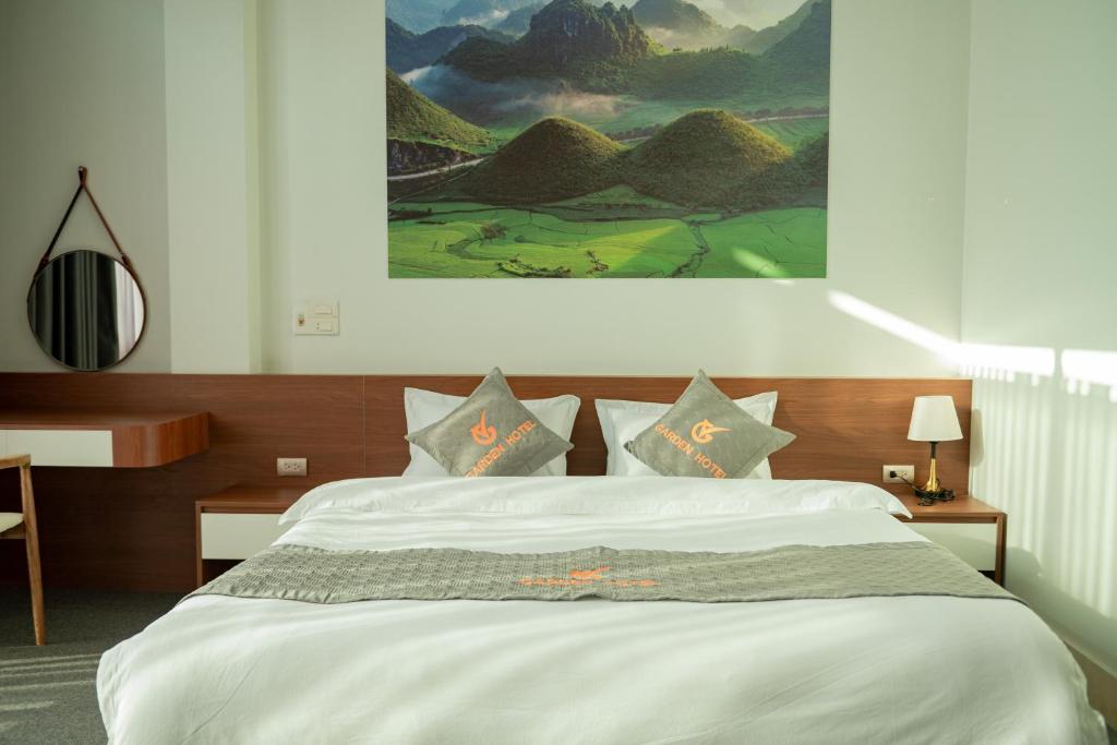Postel nebo postele na pokoji v ubytování Garden Hotel II