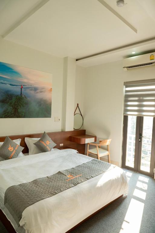 Postel nebo postele na pokoji v ubytování Garden Hotel II