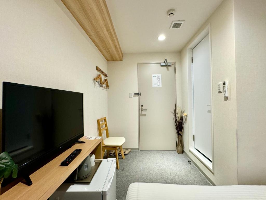 TV a/nebo společenská místnost v ubytování Y&Y NAMBA HOTEL Osaka