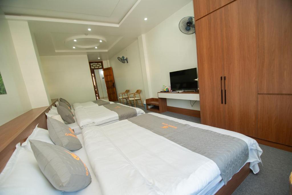 TV a/nebo společenská místnost v ubytování Garden Hotel II