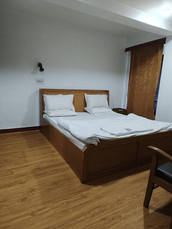 Postel nebo postele na pokoji v ubytování Hotel Ruby and Restaurant