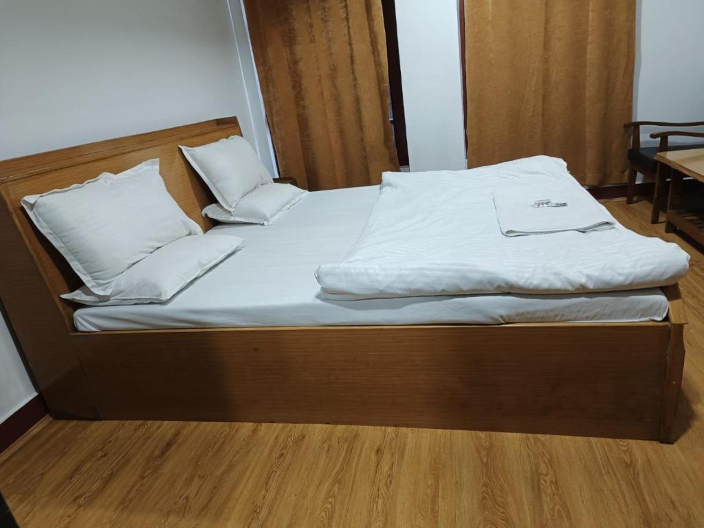 Postel nebo postele na pokoji v ubytování Hotel Ruby and Restaurant