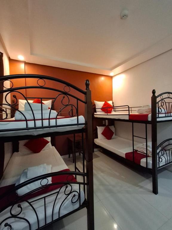 Postel nebo postele na pokoji v ubytování Royale Parc Hotel Puerto Princesa Palawan