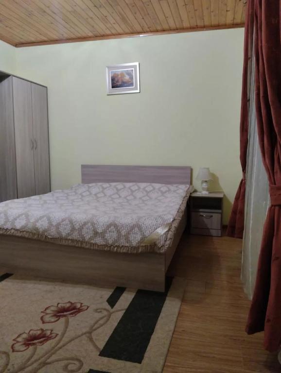 Postel nebo postele na pokoji v ubytování В Гостях на Иссык-Куле - Бархатный Сезон