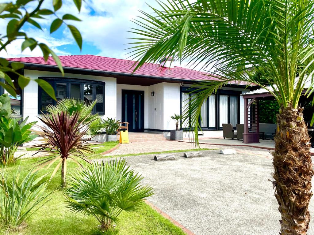 Zahrada ubytování 弓ヶ浜海水浴場徒歩1分! 一棟貸別荘! Yumigahama Beach House & BBQ!