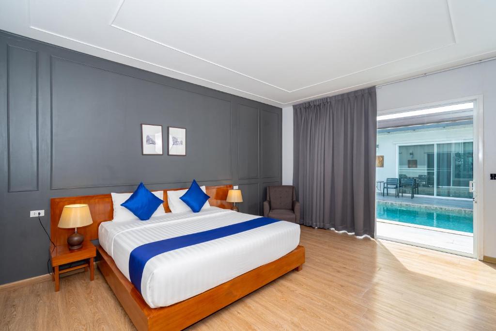 Postel nebo postele na pokoji v ubytování Phuket La Siesta Pool Villas & Pool Access Rooms