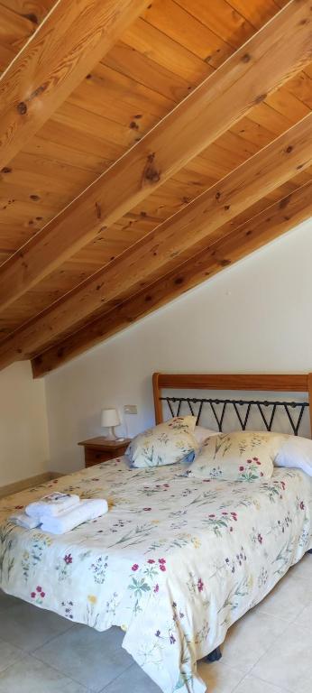 Postel nebo postele na pokoji v ubytování ALTOGREDOS Hotel Rural y apartamentos turísticos