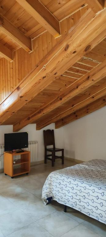 Postel nebo postele na pokoji v ubytování ALTOGREDOS Hotel Rural y apartamentos turísticos