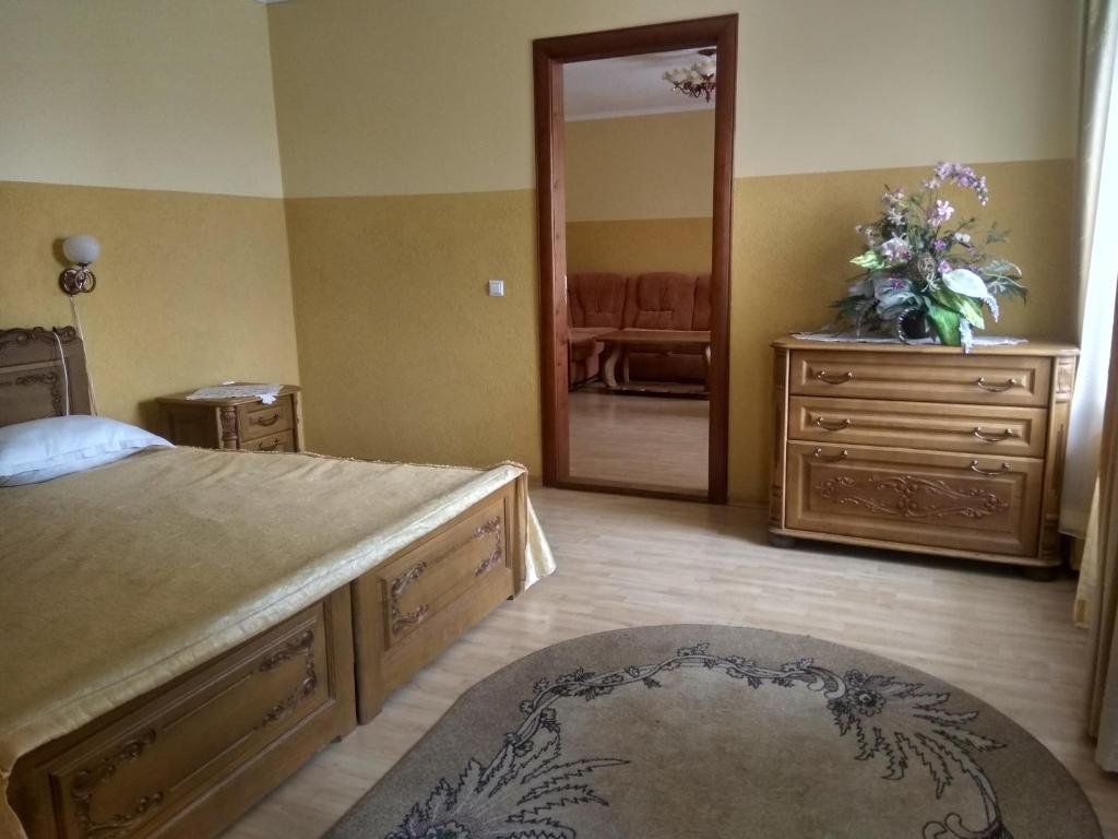 Postel nebo postele na pokoji v ubytování Hotel Smaragd