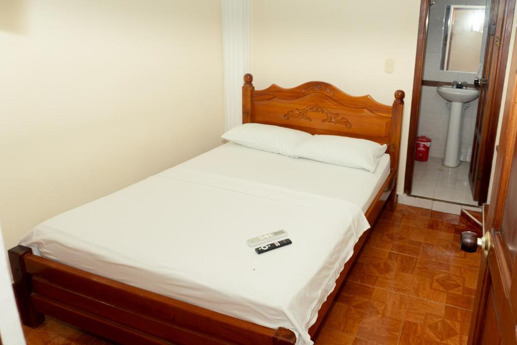 Postel nebo postele na pokoji v ubytování HOTEL GAIRA MAR