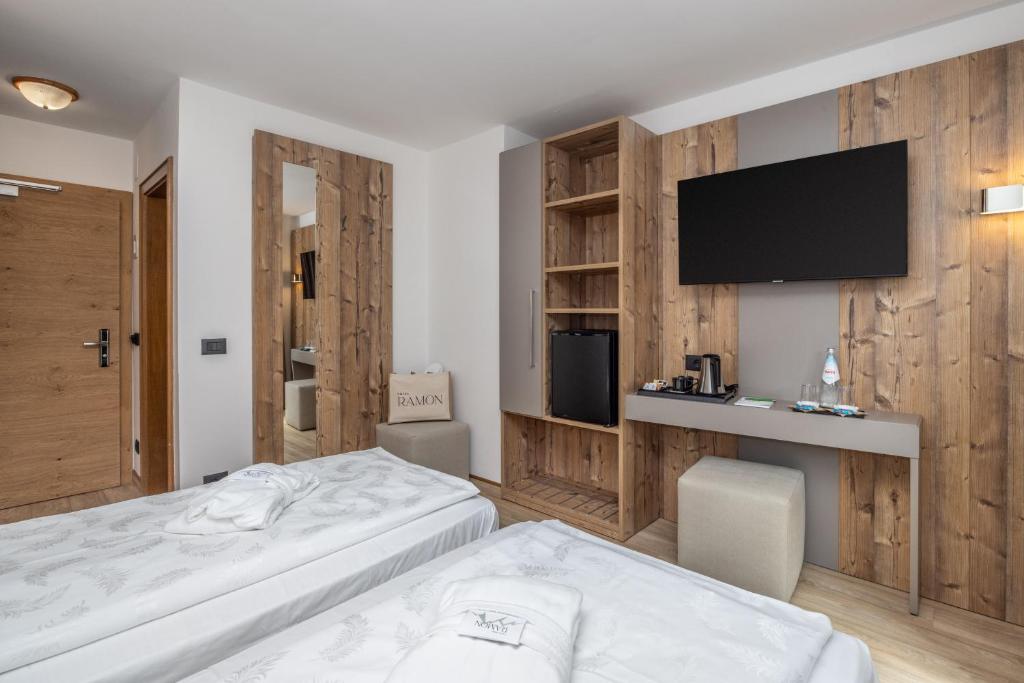 TV a/nebo společenská místnost v ubytování Hotel Ramon