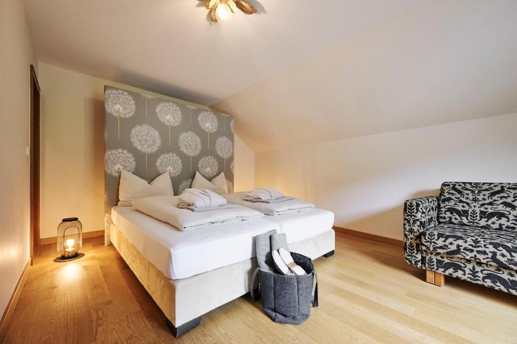 Postel nebo postele na pokoji v ubytování Arlberg Stuben - das kleine, feine Hotel