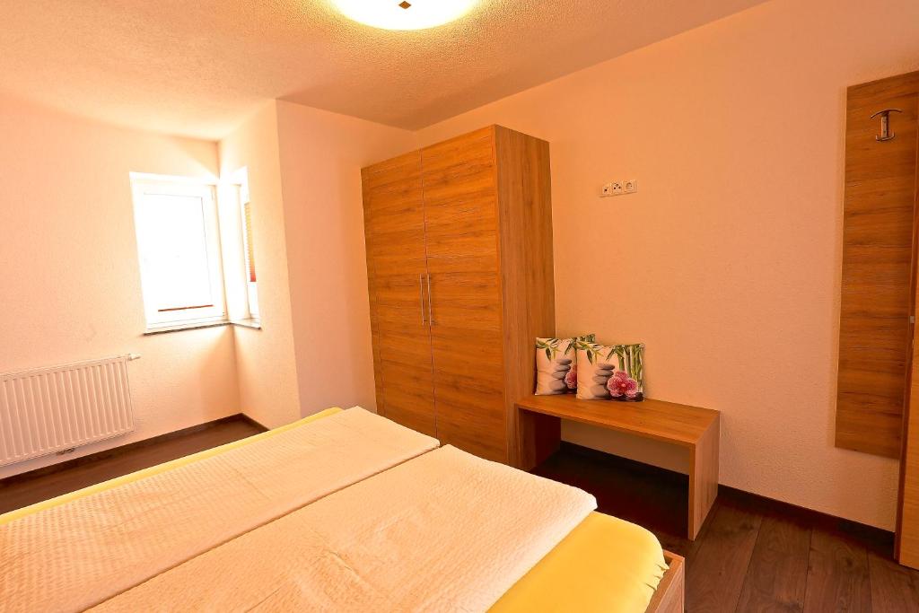Posteľ alebo postele v izbe v ubytovaní Ladis Living