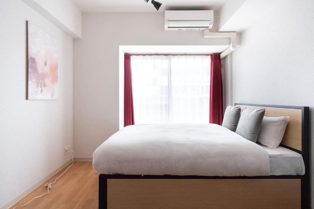 Postel nebo postele na pokoji v ubytování Axia