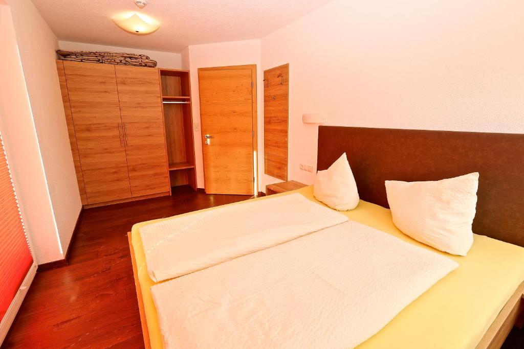Posteľ alebo postele v izbe v ubytovaní Ladis Living