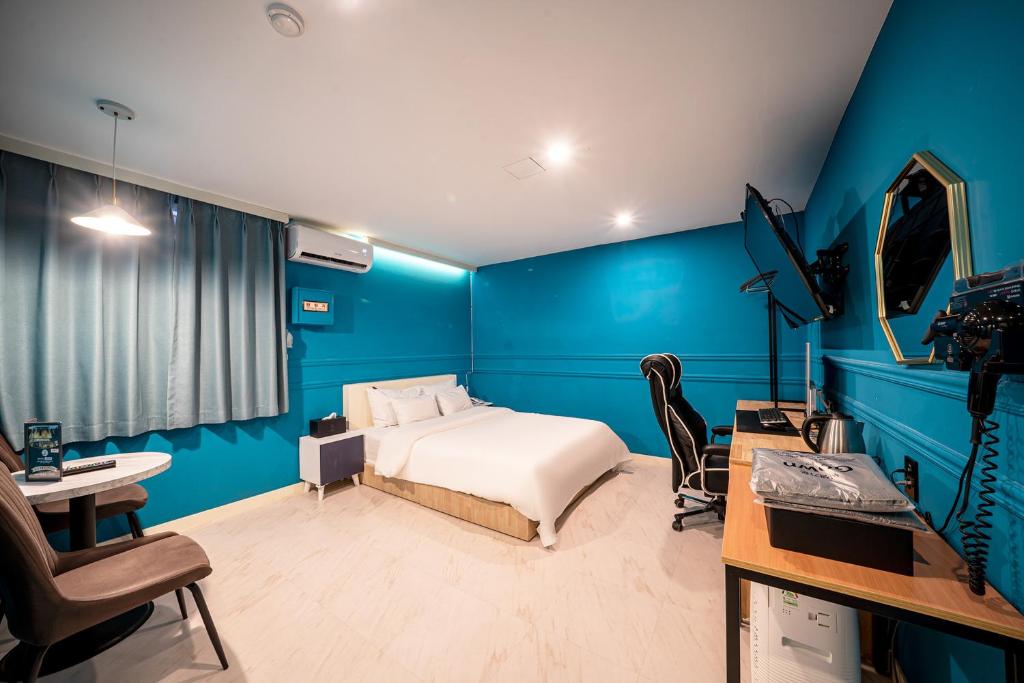 TV a/nebo společenská místnost v ubytování Hotel Bosco Incheon