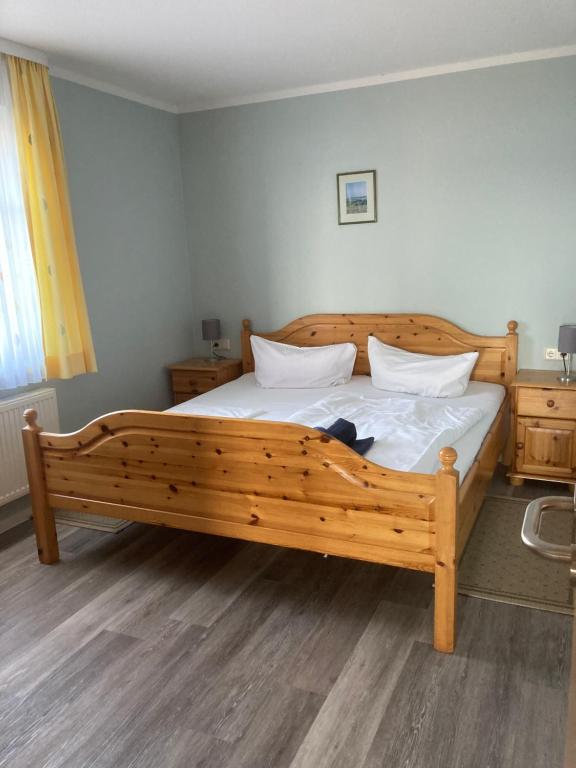 Postel nebo postele na pokoji v ubytování FeWo Lindenhof