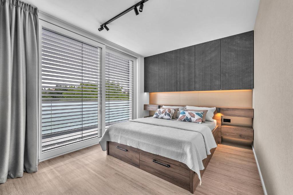 Postel nebo postele na pokoji v ubytování Apartment VIVA TEBA Vrchlabí