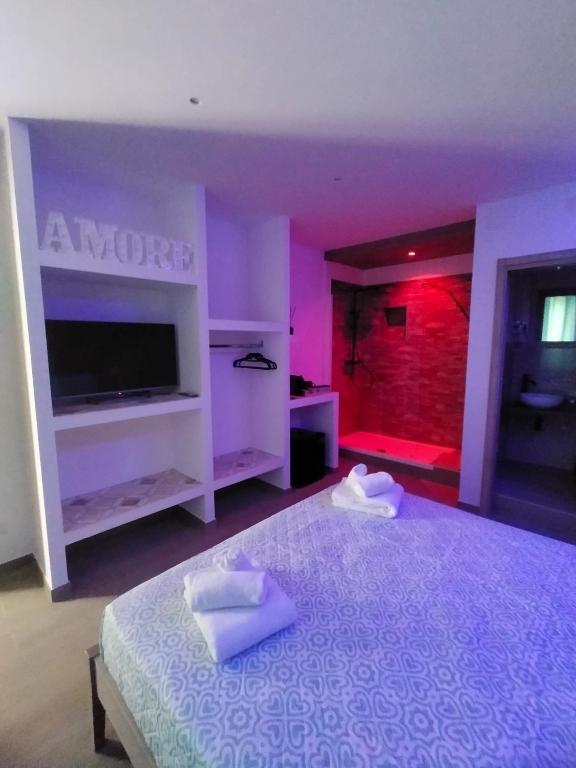 Postel nebo postele na pokoji v ubytování Blueroom jolly